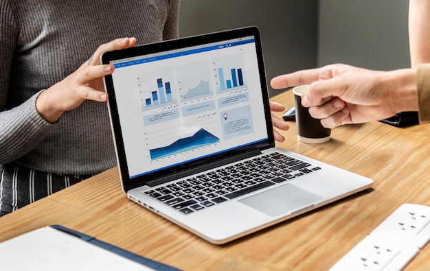 Business presentation on a laptop screen Free Photo