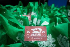 hundreds of green donation bags